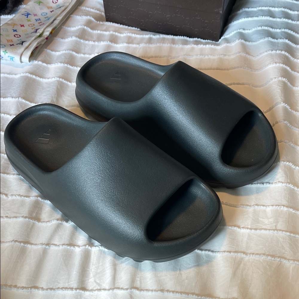 Men’s black Yeezy slides